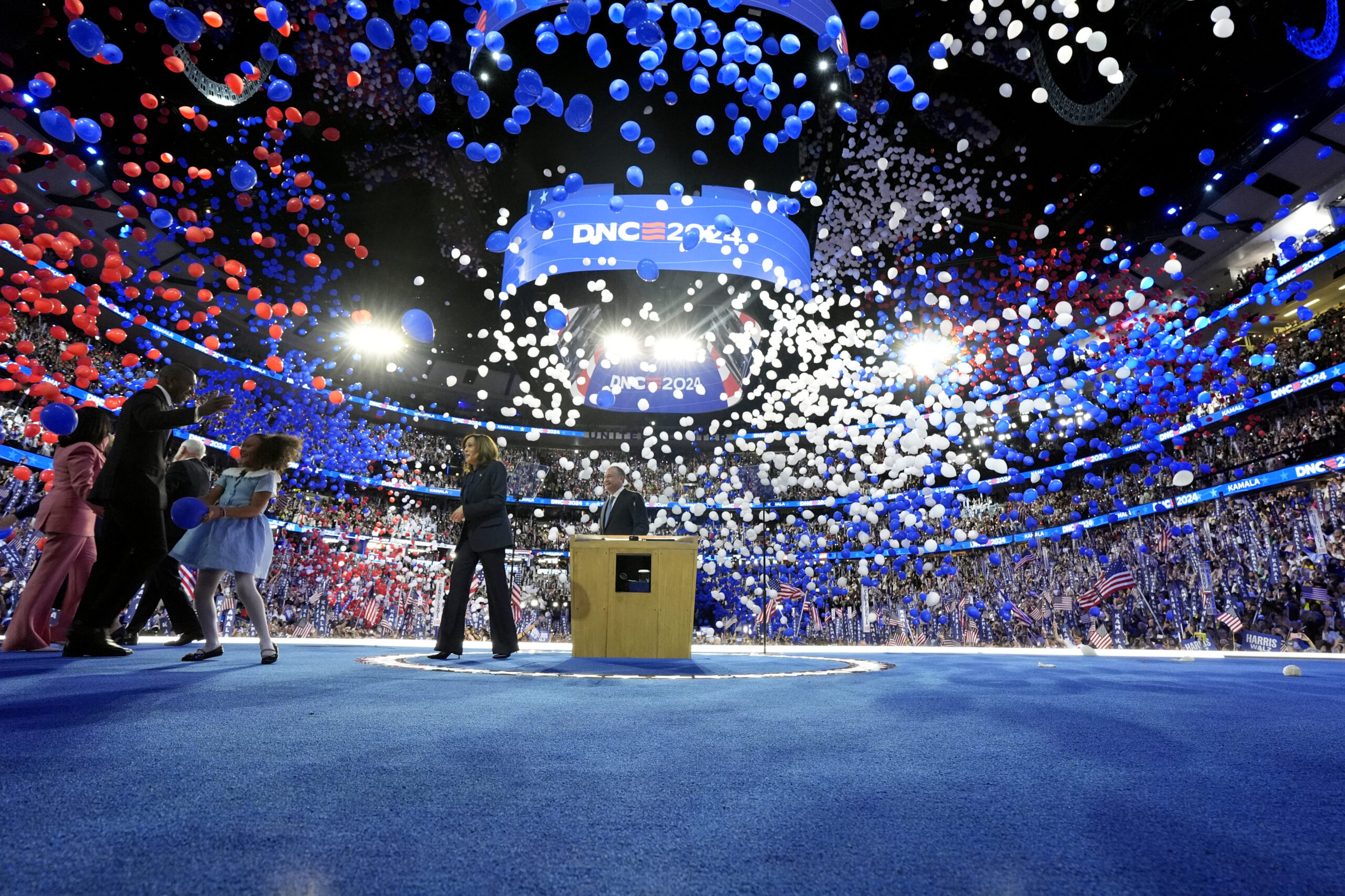 Kamala Harris celebrates with her family onstage after accepting the party's nomination (Photo: Kent Nishimura/Pool/Getty Images)