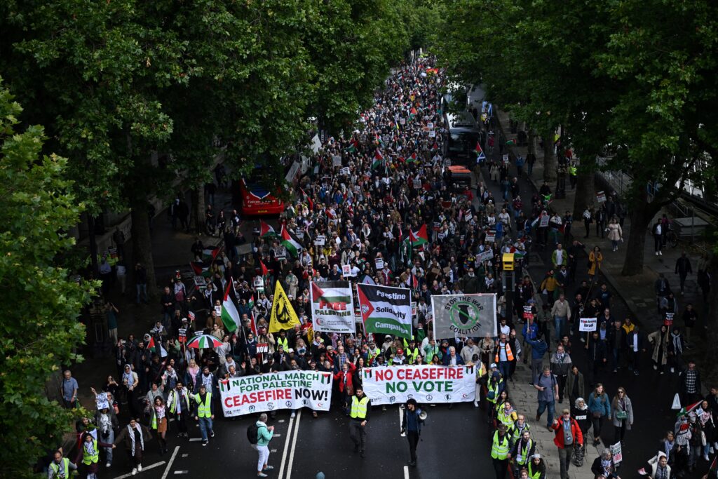 LEAD Amit 2 INSET Gaza march GettyImages 2160220870