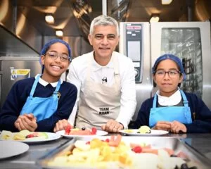 Sadiq with schoolchildren