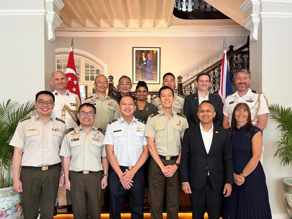 INSET 1 Nikesh Mehta with Singapore graduates from Joint Service Command and Staff College in the UK 1