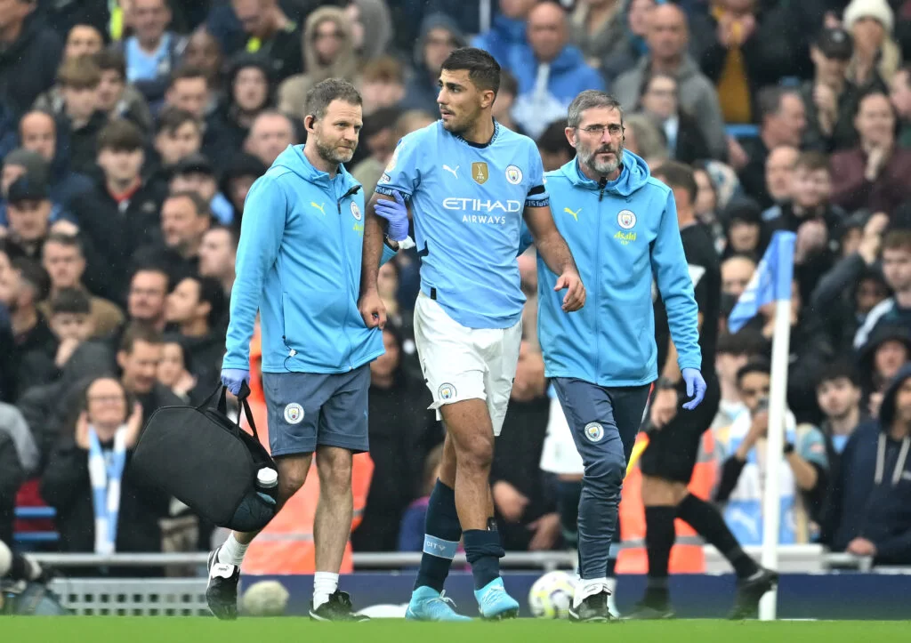 Story 2 Rodri of Manchester City leaves the pitch following an injury during the Premier League match between Manchester City and Arsenal at Etihad Stadium cre